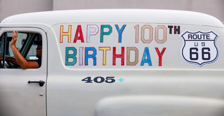A classic delivery truck decorated for Route 66's 100th birthday makes its way down 11th Street during the Route 66 Capital Cruise May 30, 2026.